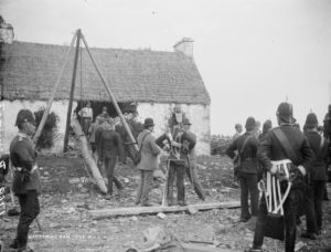 T.Birmingham's_house,_Moyasta,_Co.Clare_with_Battering_Ram_and_soldiers_outside